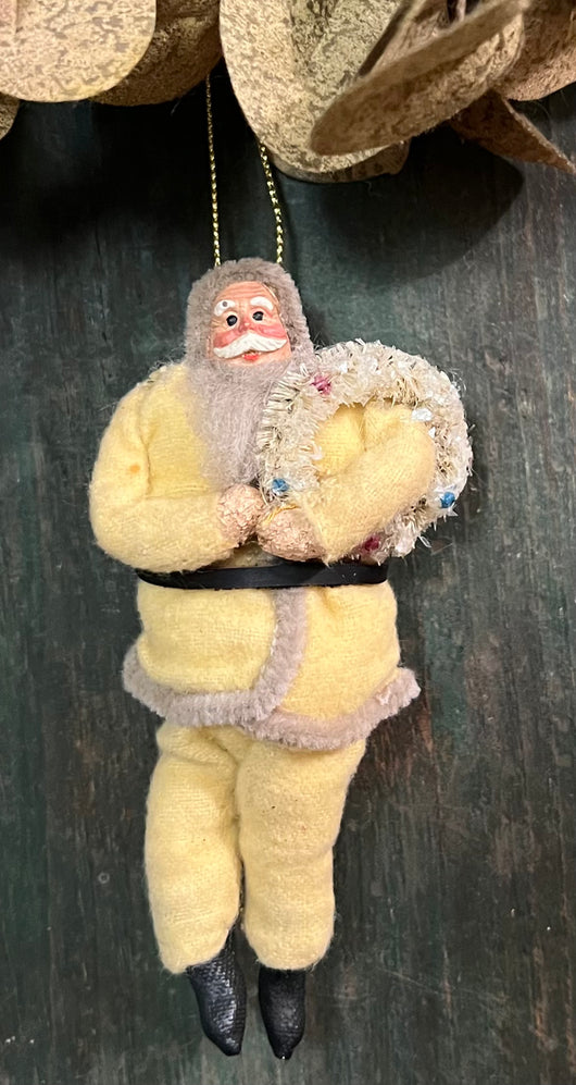 NV-191 Primitive Santa in Pale Yellow Suit Ornament