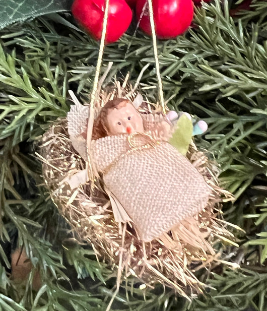 ER-2438 Plastic Baby Jesus in Walnut Shell Ornament