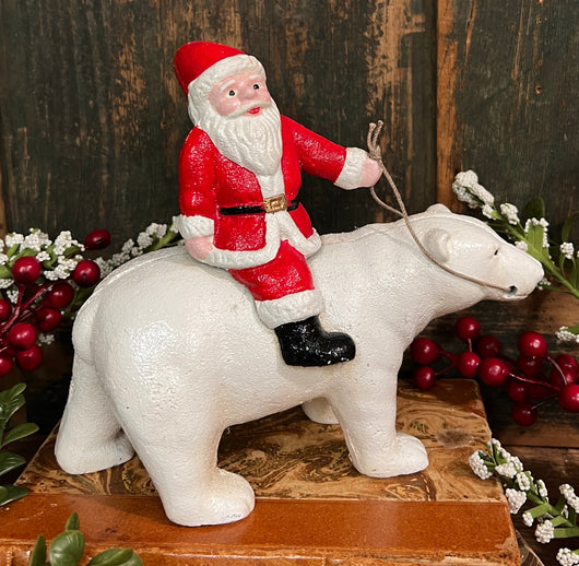 HA-04 Cast Iron Red Belsnickle on Polar Bear