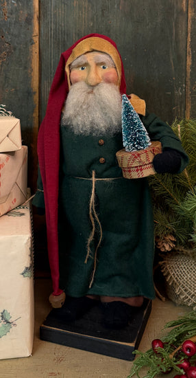OTC-S16 Santa in Green Coat with Box & Tree