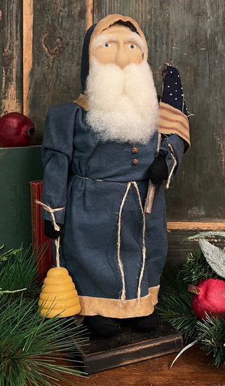 OTC-S3 Small Santa holding Flag & Beeskep